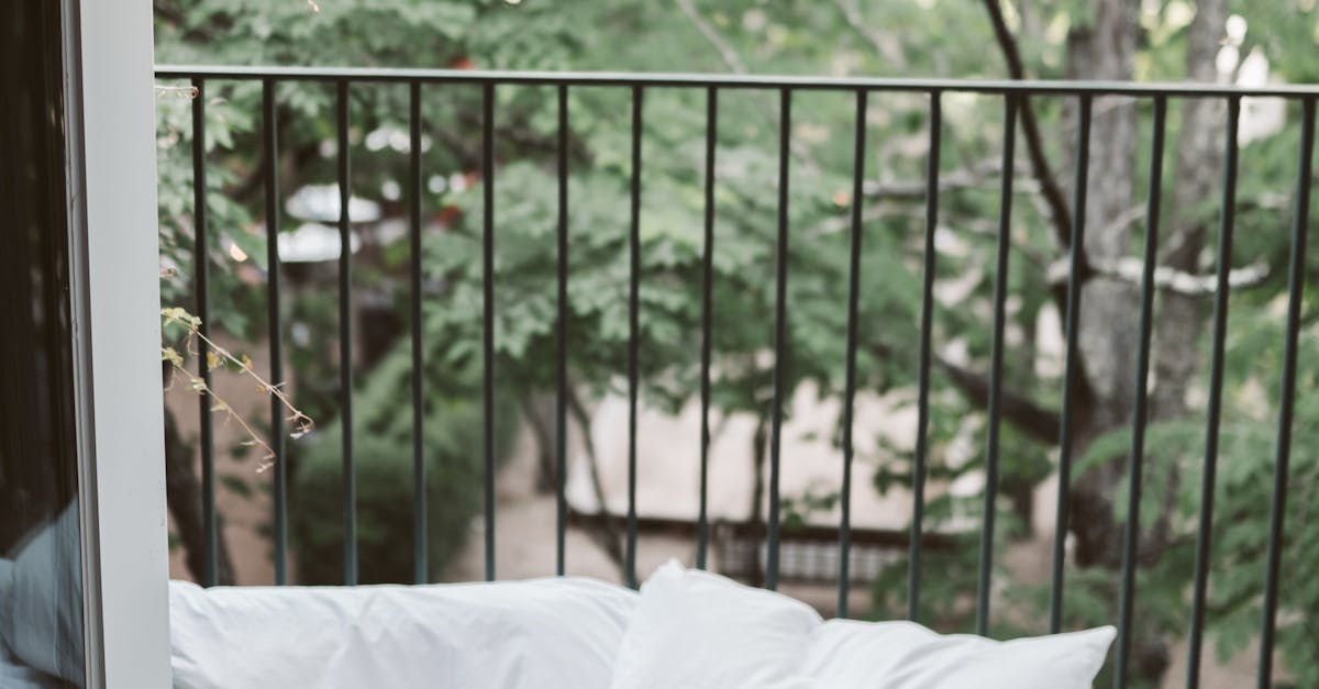 Laptop On Bed Near The Balcony